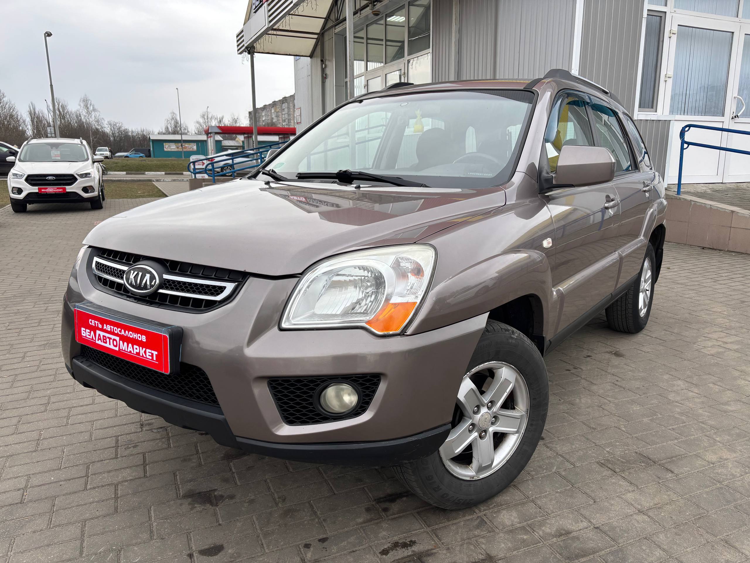 авто с пробегом kia sportage 2010