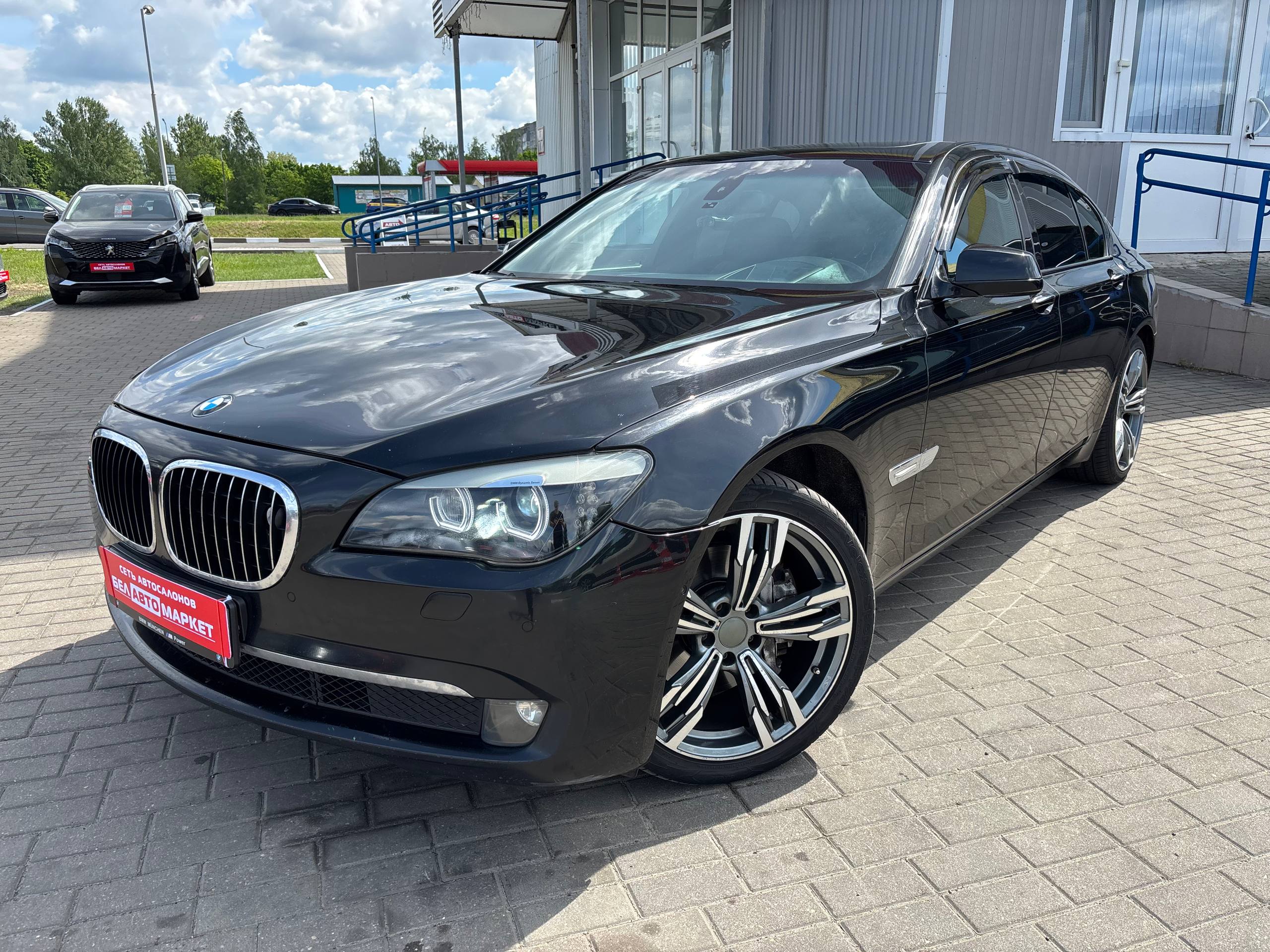 авто с пробегом bmw 7 серия 2009