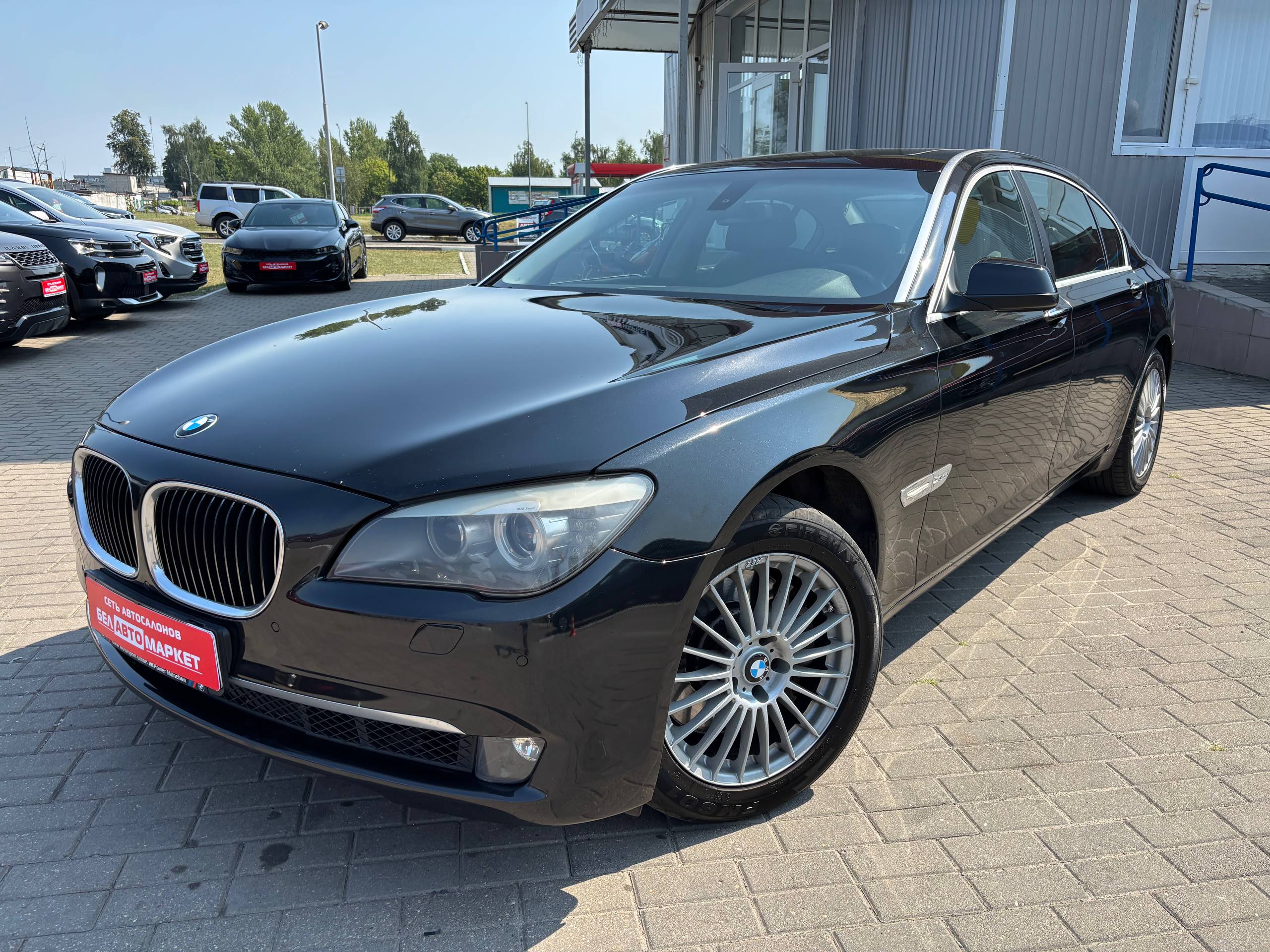 авто с пробегом bmw 7 серия 2009